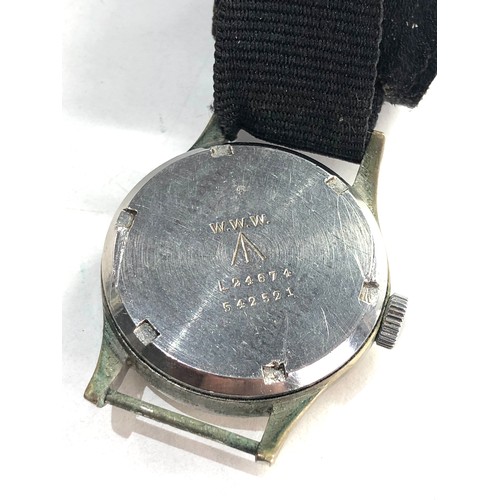 86 - Military Record dirty dozen wristwatch in working order but no warranty given