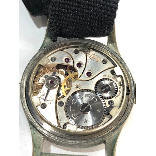 86 - Military Record dirty dozen wristwatch in working order but no warranty given