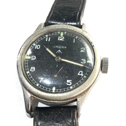 87 - Military Lemania dirty dozen wristwatch in working order but no warranty given