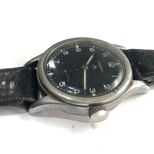 87 - Military Lemania dirty dozen wristwatch in working order but no warranty given