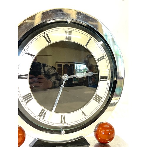 42 - Art Deco chrome mantel clock mounted with catalin balls