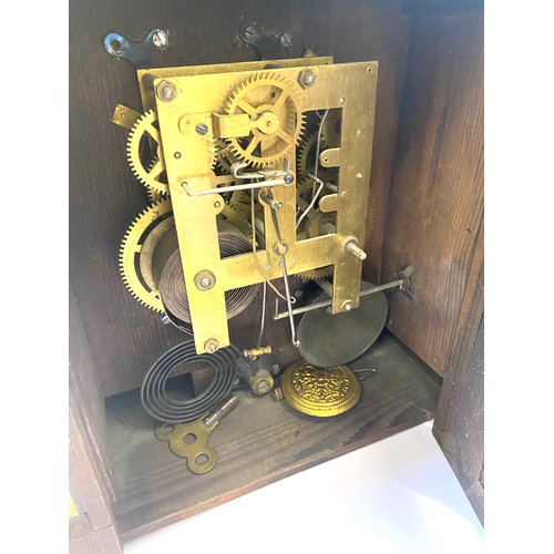 46 - American mantel clock with key and pendulum, untested Height is approx 19.5