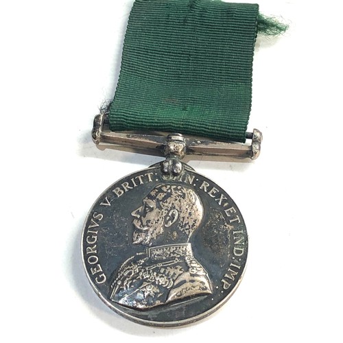 575 - G.V Volunteer force long service medal to gnr.j.flanagan 1 bde .r.a.a.f.f.i