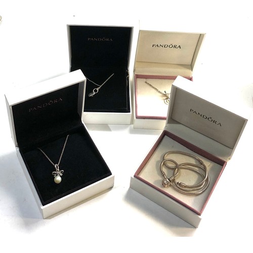 542 - 4 boxed silver pandora necklaces