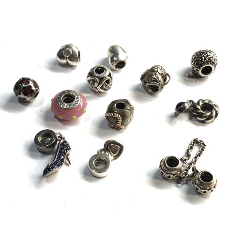 551 - 12 silver pandora charms