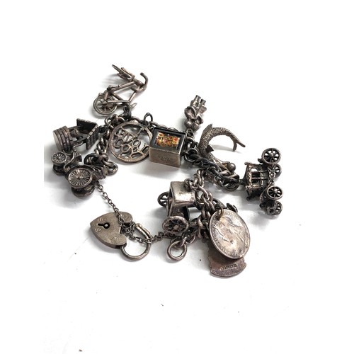 553 - Silver charm bracelet 38g