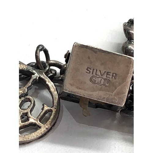 553 - Silver charm bracelet 38g