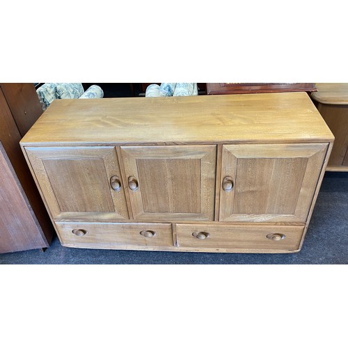 566 - Vintage 3 door, 2 drawer Ercol sideboard, good overall condition, approximate measurements Height 30... 