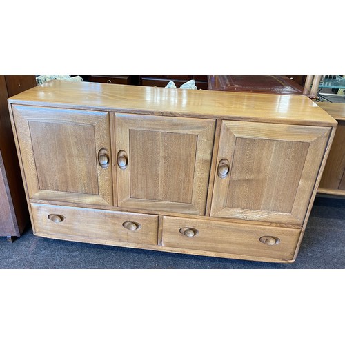 566 - Vintage 3 door, 2 drawer Ercol sideboard, good overall condition, approximate measurements Height 30... 