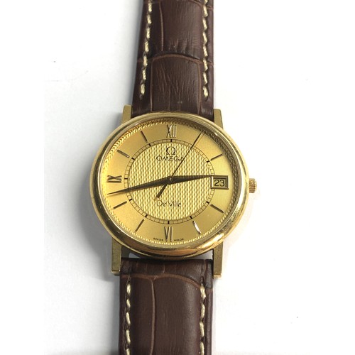 79 - 18ct gold gents  Omega de ville quartz omega leather strap requires battery in good condition no war... 