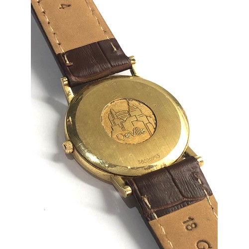 79 - 18ct gold gents  Omega de ville quartz omega leather strap requires battery in good condition no war... 