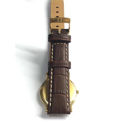 79 - 18ct gold gents  Omega de ville quartz omega leather strap requires battery in good condition no war... 