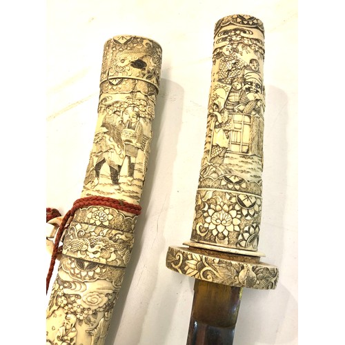 566 - Fine 19th century Japanese ivory katana high detailed carved handle and saya carved in relief with b... 