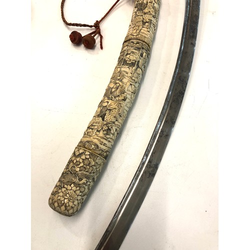 566 - Fine 19th century Japanese ivory katana high detailed carved handle and saya carved in relief with b... 