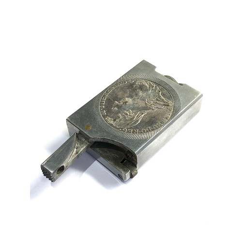 567 - Silver coin cigarette lighter silver coin each side