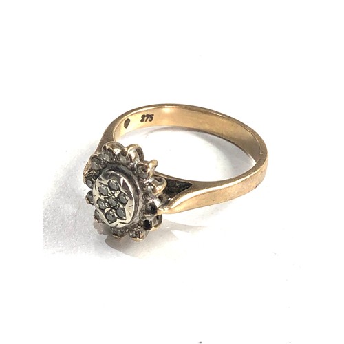 540 - 9ct gold diamond ring 3.5g missing 2 halo diamonds