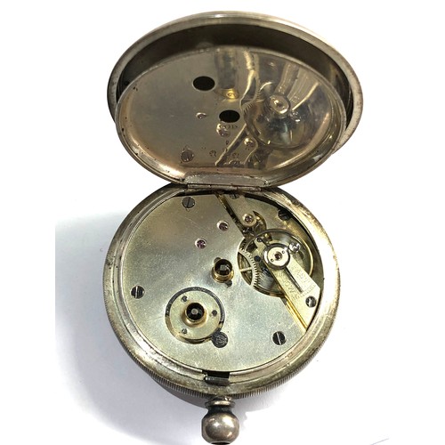 516 - Antique open face silver pocket watch watch is ticking but no warranty given missing loop