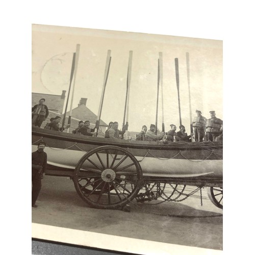 572 - 2 antique real photo postcards R.M.S Lusitania at liverpool landing stage & watchet lifeboat & crew