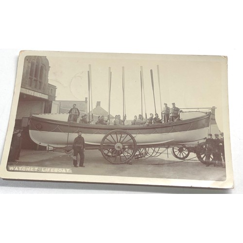 572 - 2 antique real photo postcards R.M.S Lusitania at liverpool landing stage & watchet lifeboat & crew