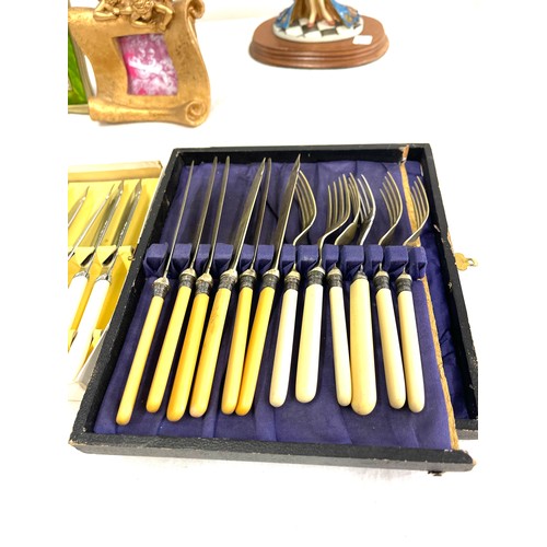 37 - Selection of items to include silver plated cutlery, photo frames and an ornament