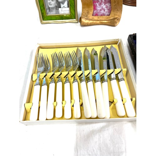 37 - Selection of items to include silver plated cutlery, photo frames and an ornament