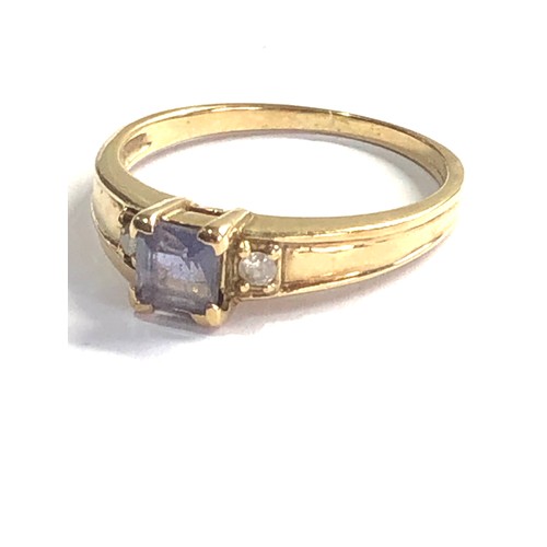 474 - 9ct gold topaz & diamond ring weight 1.9g