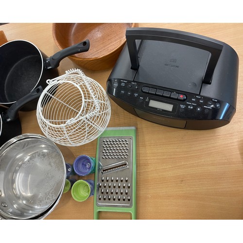 230 - Selection of kitchenalia includes pots, pans, radio, chopping boards etc