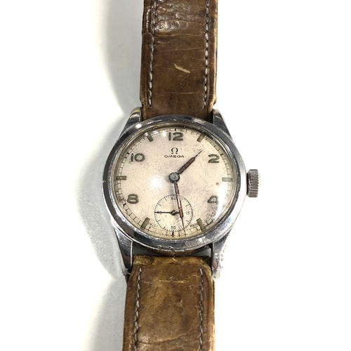 506 - Vintage Gents military style Omega wristwatch omega strap and buckle watch is ticking but no warrant... 