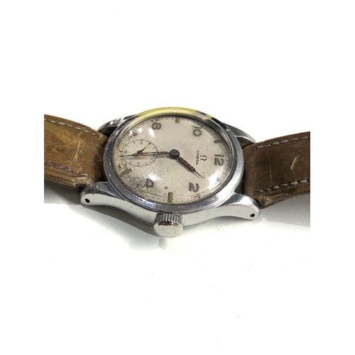 506 - Vintage Gents military style Omega wristwatch omega strap and buckle watch is ticking but no warrant... 