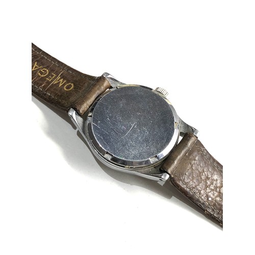 506 - Vintage Gents military style Omega wristwatch omega strap and buckle watch is ticking but no warrant... 