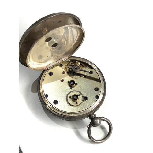 517 - Silver open face pocket watch the watch is ticking but no warranty is given