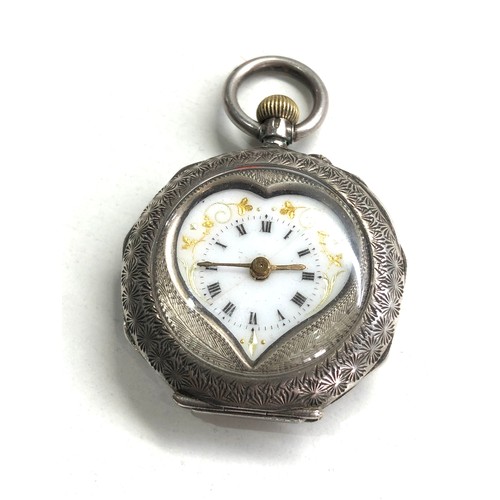 518 - Ladies antique silver fob watch heart shaped the watch is ticking but no warranty given back cover d... 