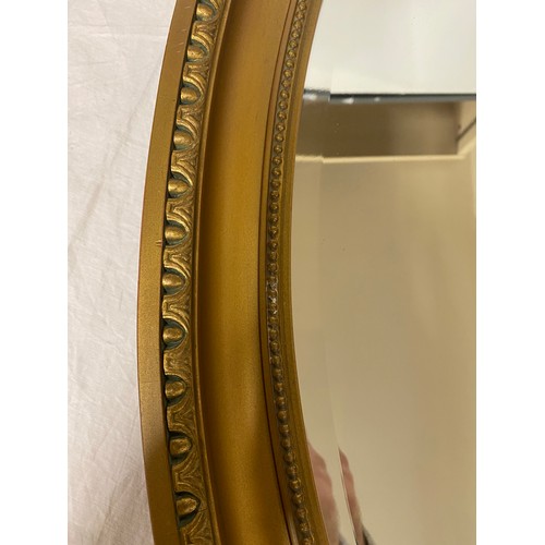 103 - Antique gilt framed beveled edge mirror measures approx 34.5