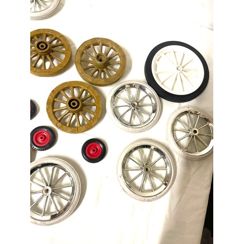 76 - Box of assorted toy wheels