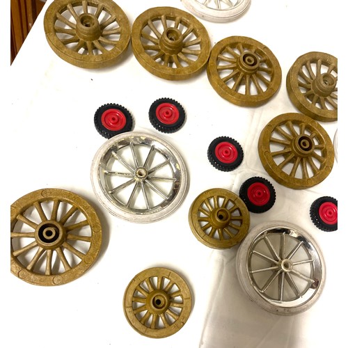 76 - Box of assorted toy wheels