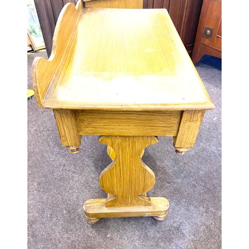 396 - Pine scramble wash stand with centre drawer measures approx 33.5