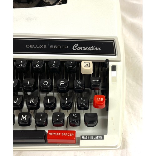 169 - Cased brother delux 660tr type writer