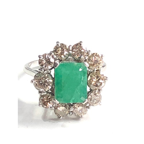 65 - Vintage platinum diamond & emerald ring central emerald with 1.25ct diamonds