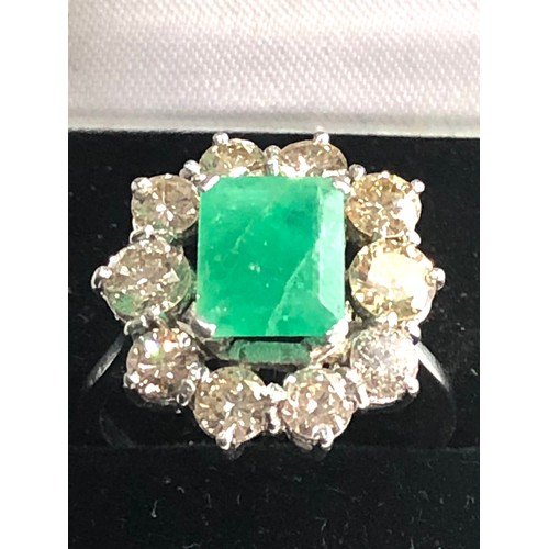 65 - Vintage platinum diamond & emerald ring central emerald with 1.25ct diamonds