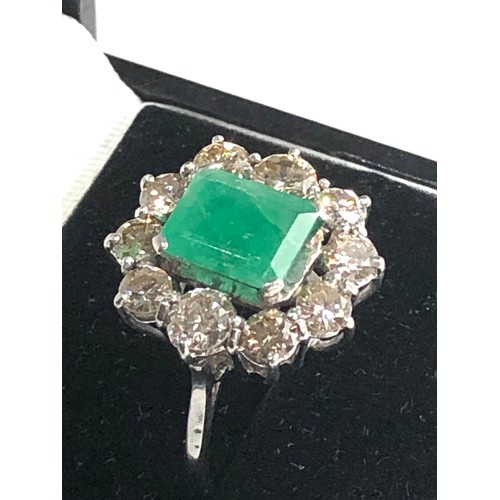 65 - Vintage platinum diamond & emerald ring central emerald with 1.25ct diamonds