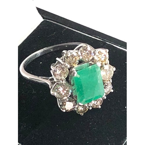 65 - Vintage platinum diamond & emerald ring central emerald with 1.25ct diamonds