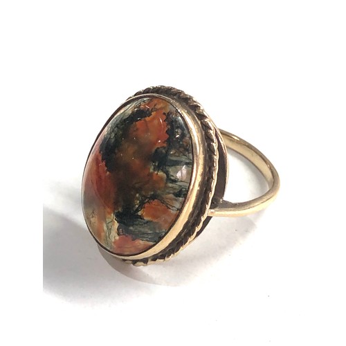 66 - 9ct gold moss agate dress ring weight 6g