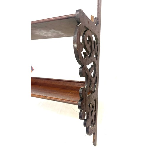 432 - Two mahogany wall racks