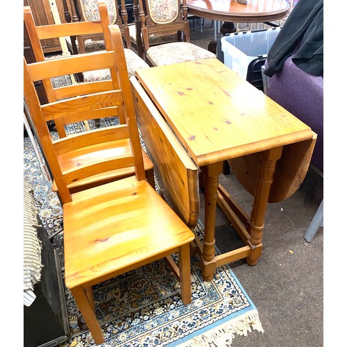 404 - Drop leaf table and two pine chairs