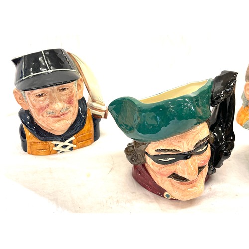 449 - 4 Royal Doulton toby jugs, Robinson Crusoe, Dick Turpin, The Poacher, The Yachtsman