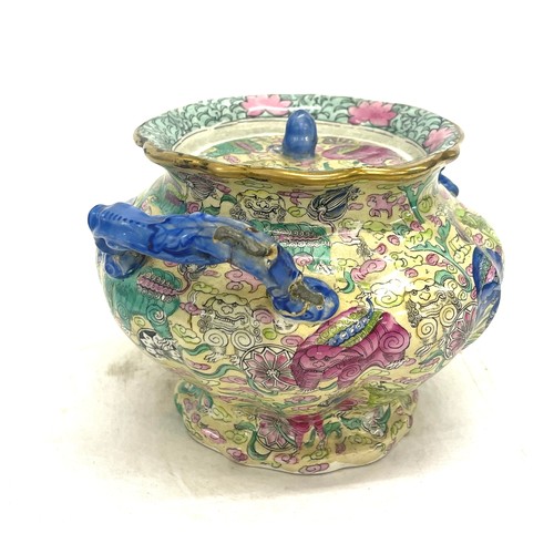 467 - Oriental lidded 2 handled pot, approximate height 6 inches, Width 8 inches, no markings to base