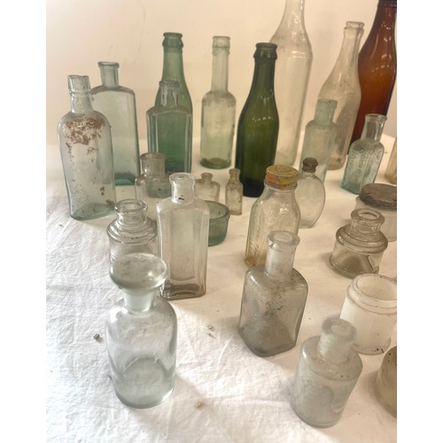 94 - Large selection vintage glass medicine bottles