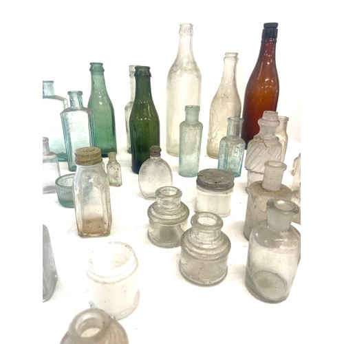 94 - Large selection vintage glass medicine bottles