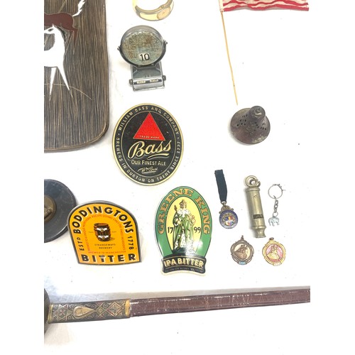 117 - Large selection of miscellaneous items includes beer tags, sword etc