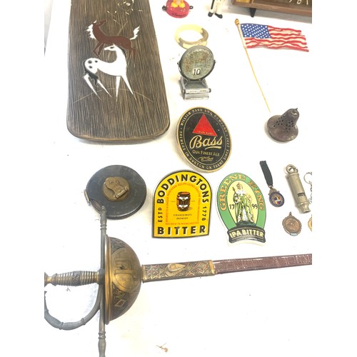 117 - Large selection of miscellaneous items includes beer tags, sword etc